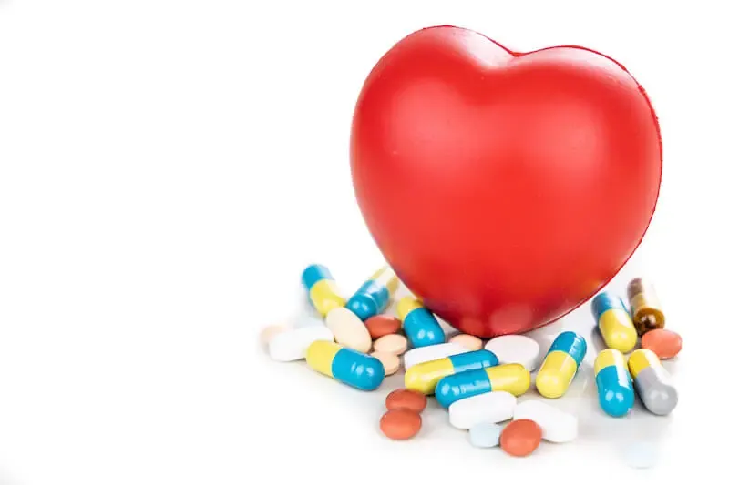 God's medication showing pills and a heart