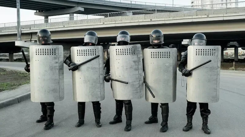 Keep thy Heart with all Diligence showing security guards with shields