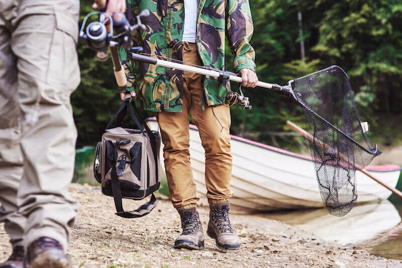 The Left their Nets and Followed Him showing two fishermen coming from their boat