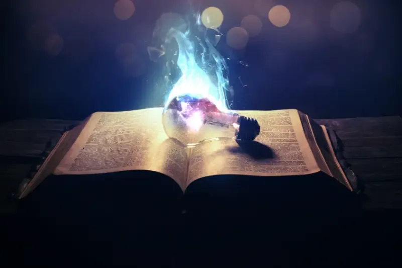 All scripture given by inspiration showing the Bible and a lightbulb