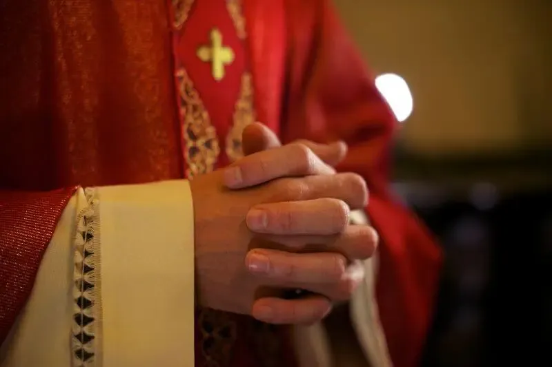 believer as priest showing a priest garment