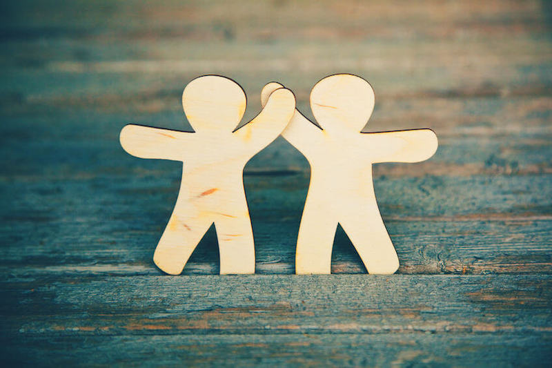 Bible verses about friendship image showing two friends