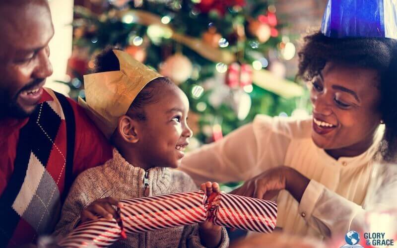 Christmas bible verses image showing a happy family