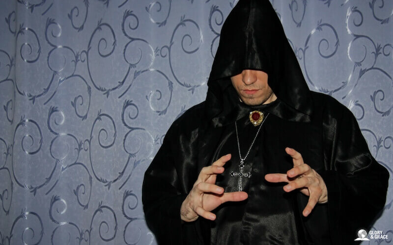 Deliverance from power of satan showing a voodoo man standing