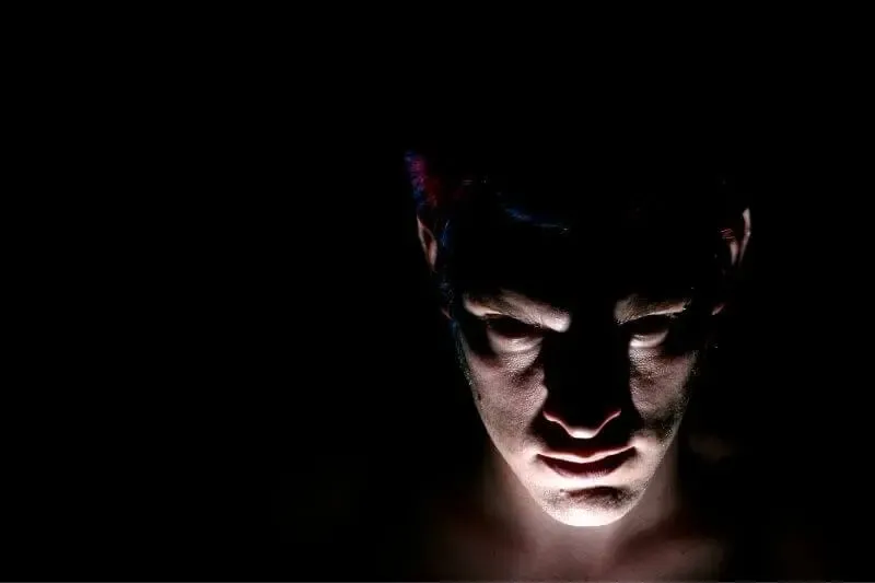 demonic possession or oppression showing a man's face.