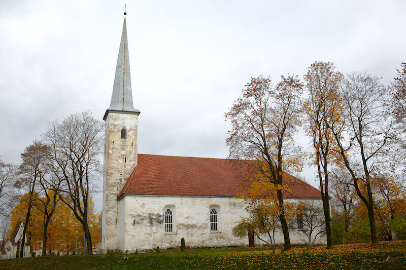 denominational walls coming down and unity of the faith showing an old church building