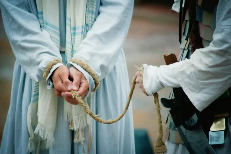 Christ's sufferings showing a man with his hands tied