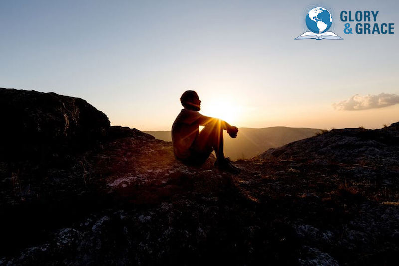 Gift of grace showing a man sitting quietly in God's presence