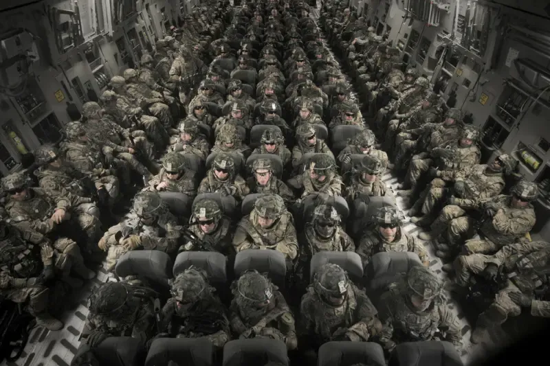 hell's reponse to heaven's plan for Christmas showing marines in a plane