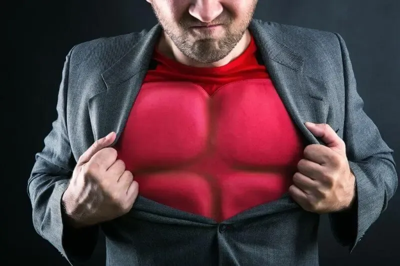 Chist dwelling in us showing a man opening up his shirt