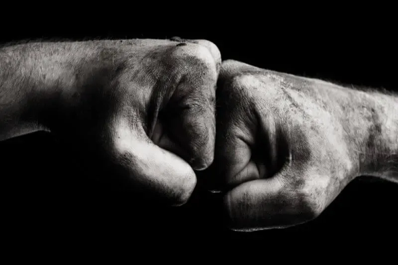 meaning of resisting the devil showing two fists