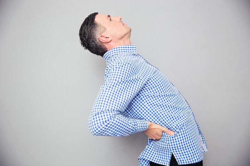 divine healing showing a man with waist pain