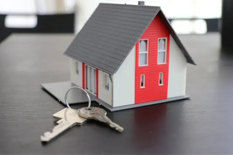 keys to enter the kingdom of God showing Keys and a little house