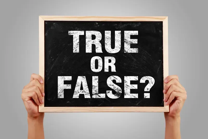 Misconceptions about the kingdom of God showing someone having a banner with true or false