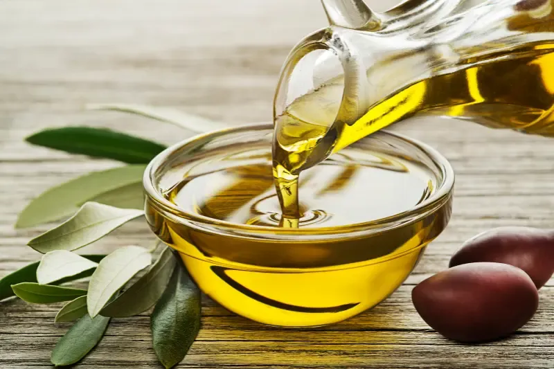 outpouring of the Spirit spoken of by Moses showing a bottle of olive oil being poured