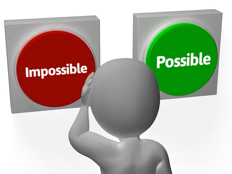 Nothing impossible with God showing a man looking at the words possible and impossible