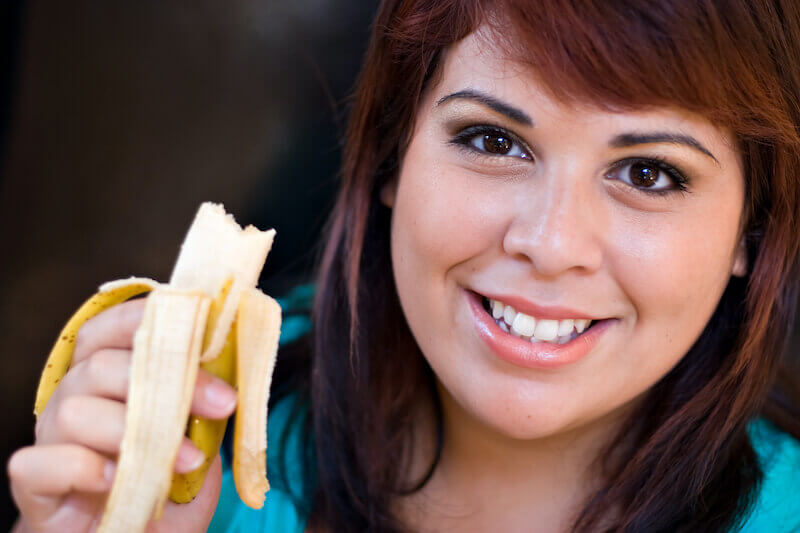 overcoming lust showing a woman eating a banana