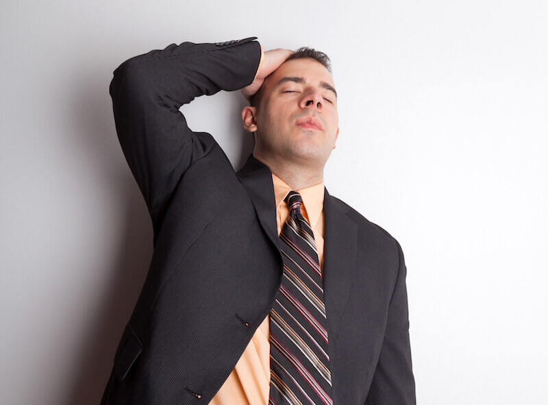 Perilous times showing a stressed out man