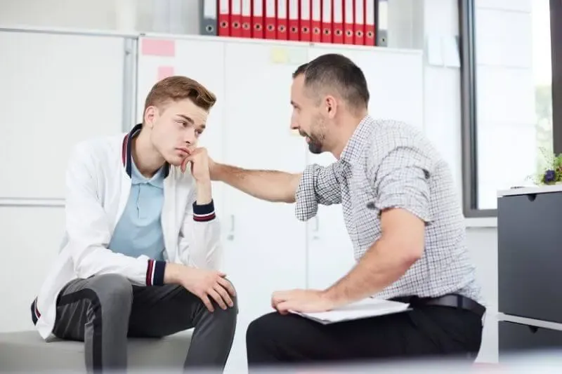 power of counsel showing a man talking to a teenager