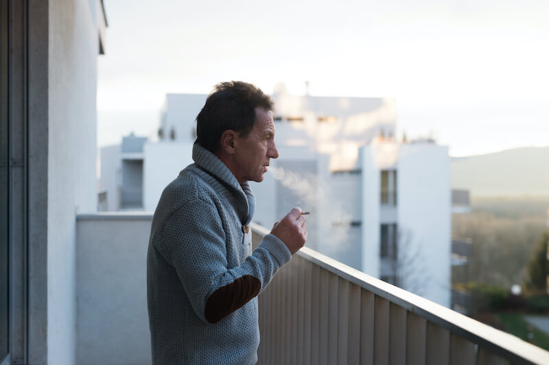 habits showing a man smoking