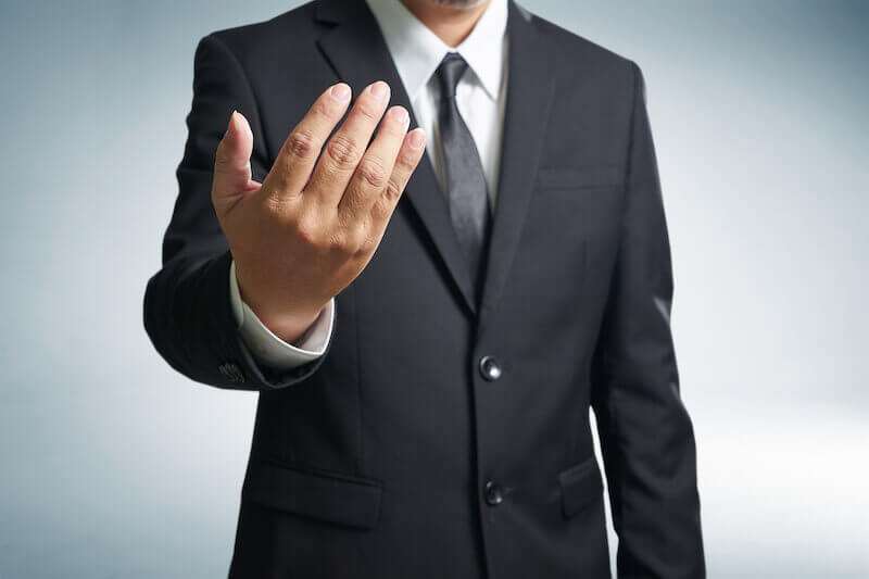 God called us showing a man calling with his hands
