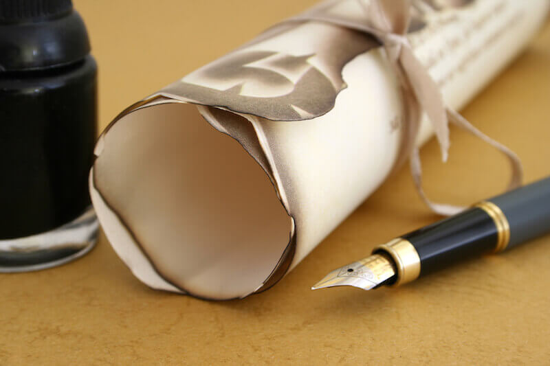 Say to archippus image showing a scroll and a paper
