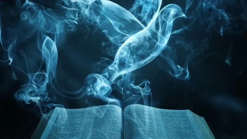 scriptures alive by the Spirit showing a dove hovering on the bible