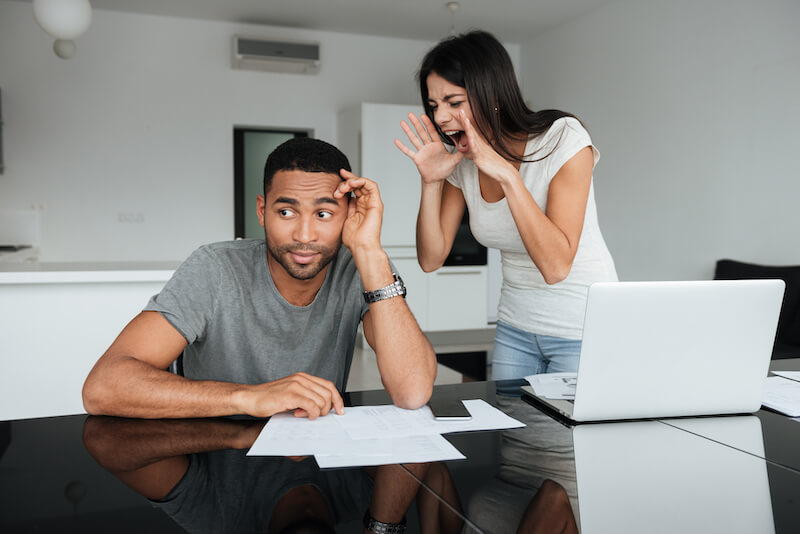 Slow to anger showing a couple querrelling over money