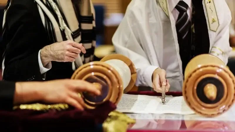 the spirit and power of Elijah showing a man with a scroll