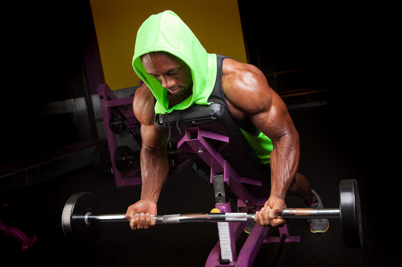 strengthened with might by His spirit in the inner man showing a man building muscles in a gym