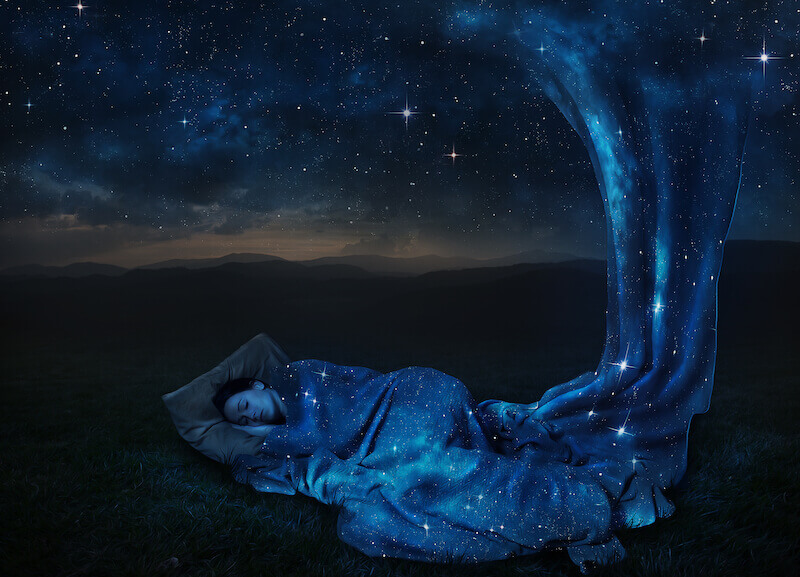 form of God showing a woman sleeping with a blanket of stars
