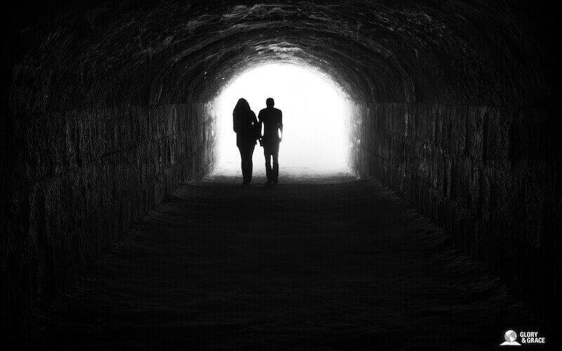 The God of hope image showing someone coming out of darkness
