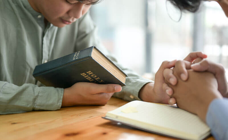 the prayer of the upright is his delight showing a man praying