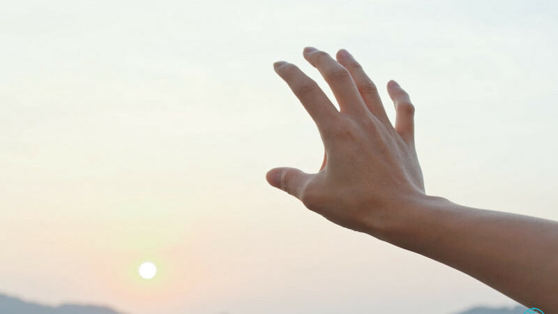 The touch of God showing a hand