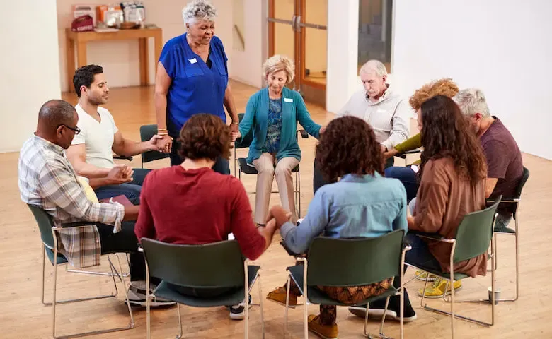two or three gathered in his name showing a group of believers praying