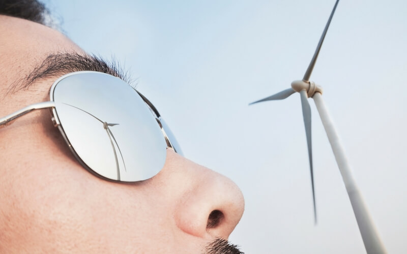 The spirit realm image showing a man watching a windmill