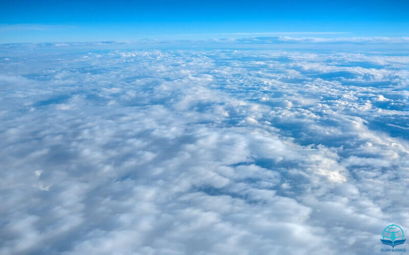 Who is like the Lord image showing the skies with clouds