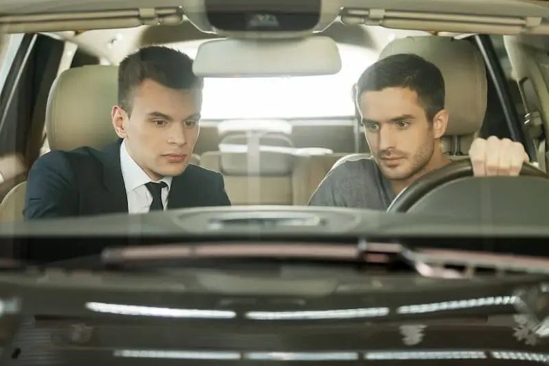 Yeshua or Jesus showing two men doing in a car
