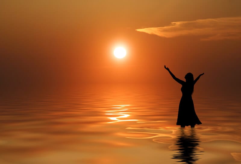Offer Up Spiritual Sacrifices showing a woman praising God