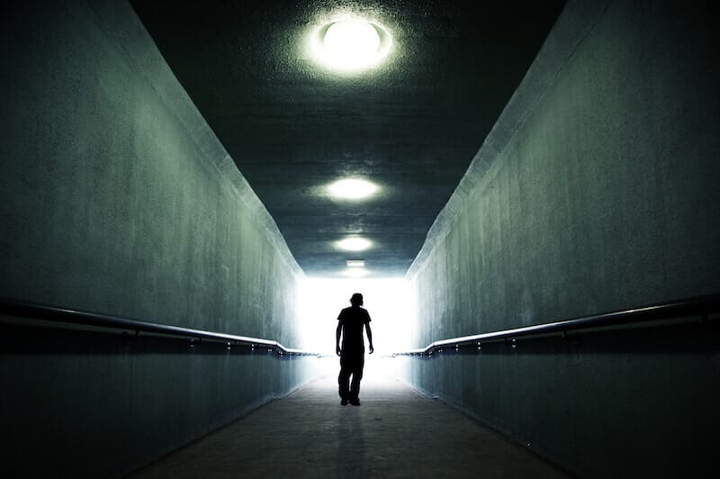 let us walk in the light of the Word showing a man walking in light