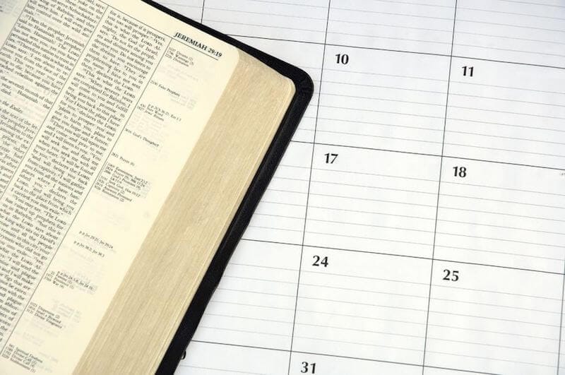 Daily devotions showing Bible and a calendar