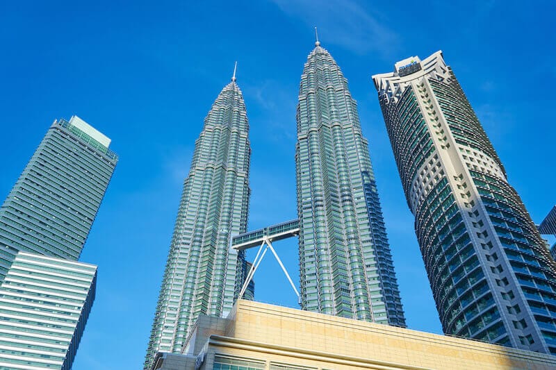 Far above all principalities showing two tall buildings