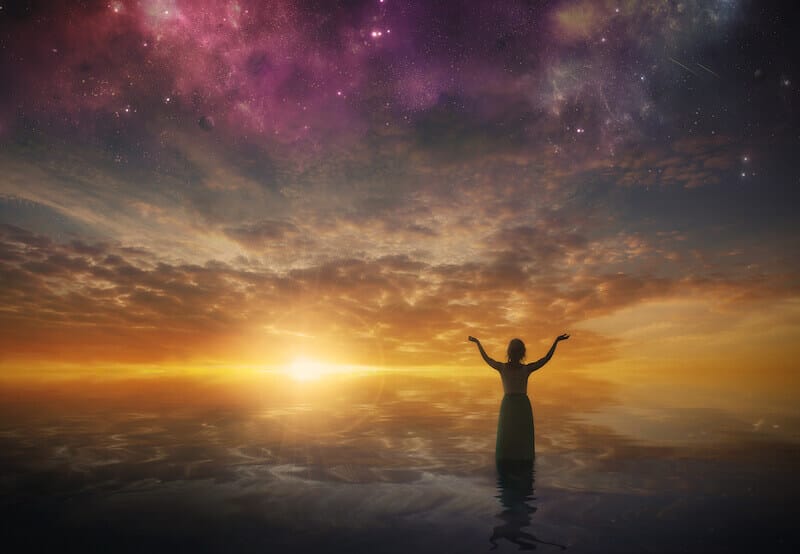 praising the Lord showing a woman lifting up her hands