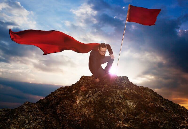 thou shalt do great things and prevail showing a man on mountain top