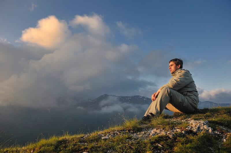 shew me thy glory showing a man sitting and looking up to heaven