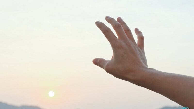 The touch of God showing a hand