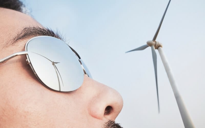 The spirit realm image showing a man watching a windmill