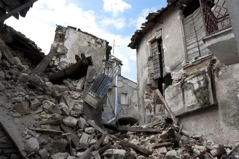 Unmerited showing a delapidated building