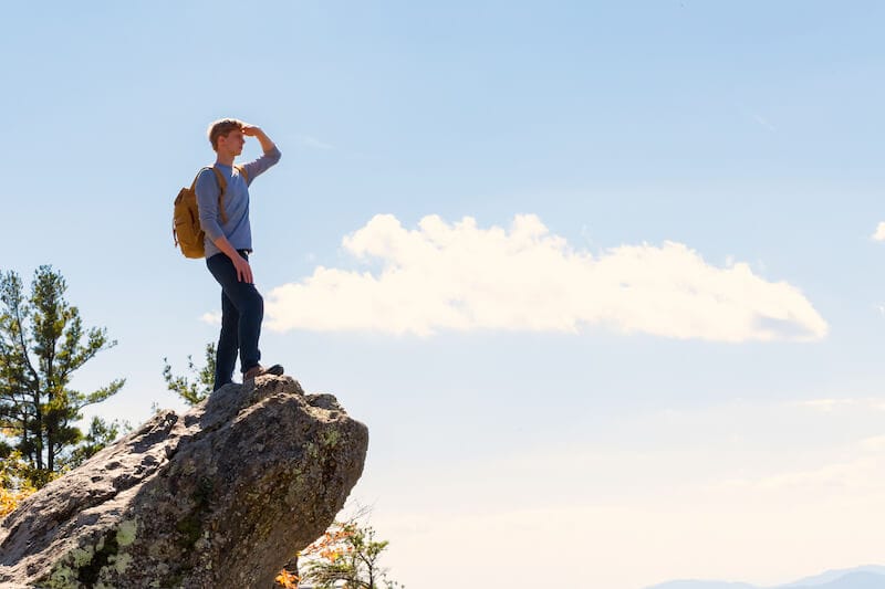 without faith impossible to please God showing a man on a hill looking across