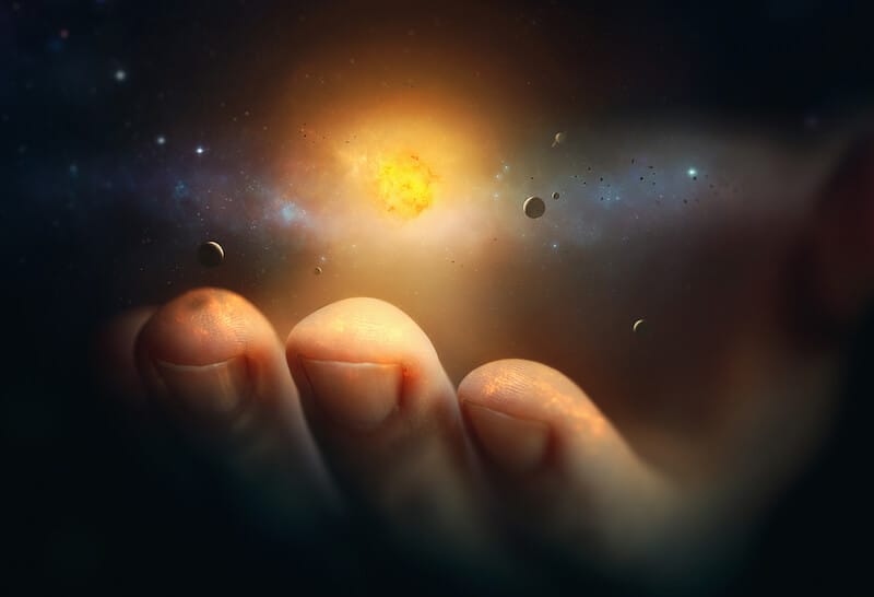 His word are spirit and life showing a hand holding the universe